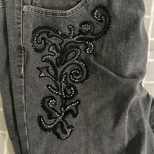 grey flared jeans with embroidery